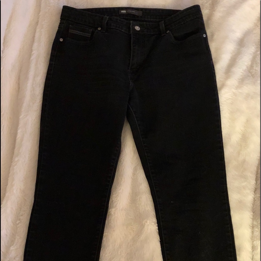 Levi’s mid-rise skinny jeans, black